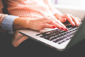 Woman working on a laptop: Starting to work part-time can bring its own challenges and emotions.