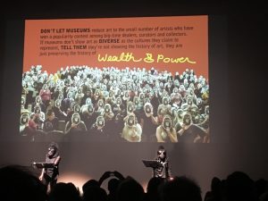 Photo of the presentation with text written on it