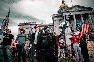 Group of people protesting Joe Biden's election - Photo by Colin Lloyd on Unsplash