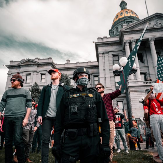 Group of people protesting Joe Biden's election - Photo by Colin Lloyd on Unsplash